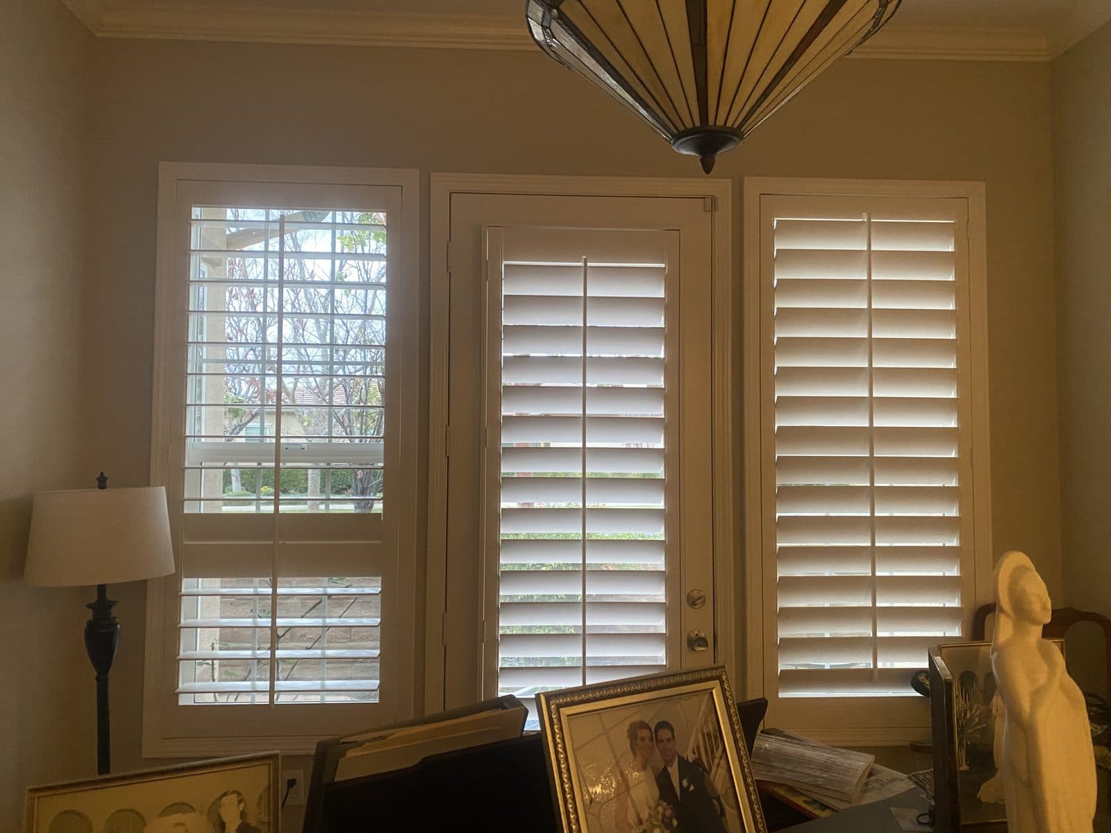 Plantation shutter panel taken off a sliding glass door during repair. Real AAA Shutter Repair job photo.